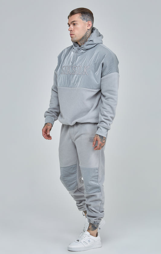 Pantalon de jogging gris en polaire à revers et empiècements