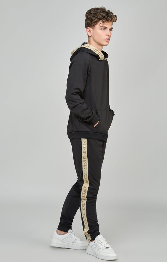 Pantalon de jogging noir à bandes coupe ajustée pour garçon