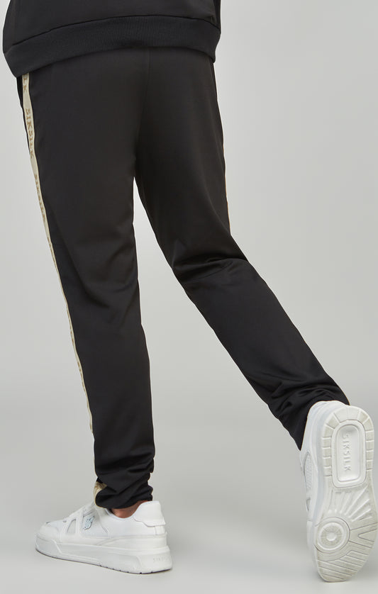 Pantalon de jogging noir à bandes coupe ajustée pour garçon